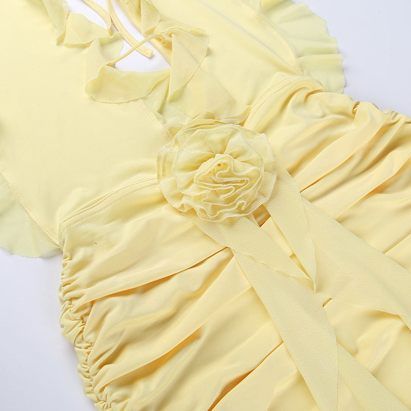 Yellow Mini Dress with Ruffles and a Flower