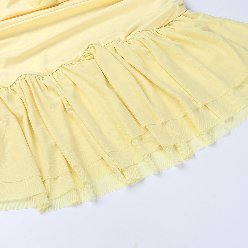 Yellow Mini Dress with Ruffles and a Flower
