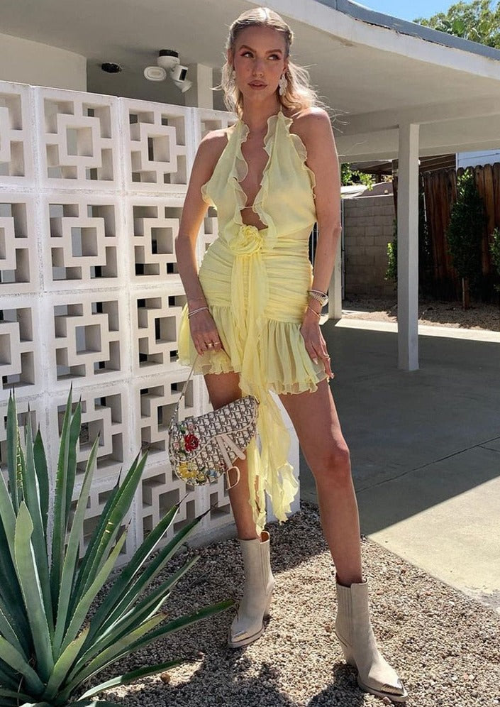 Yellow Mini Dress with Ruffles and a Flower