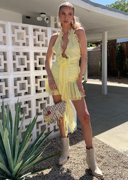 Yellow Mini Dress with Ruffles and a Flower
