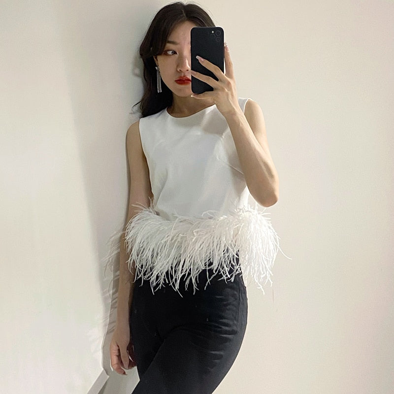 Top with feathers