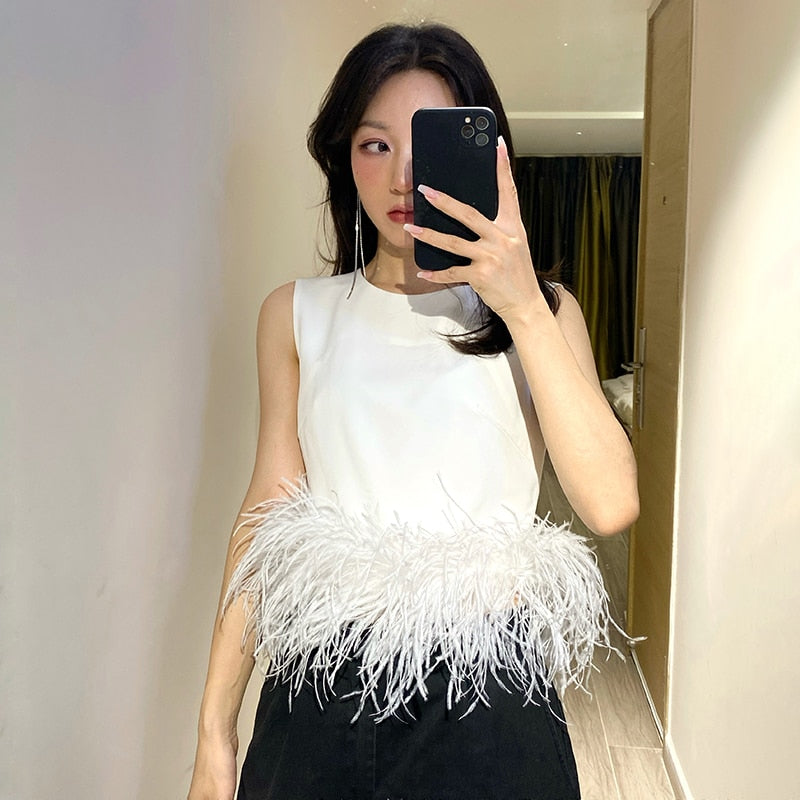 Top with feathers