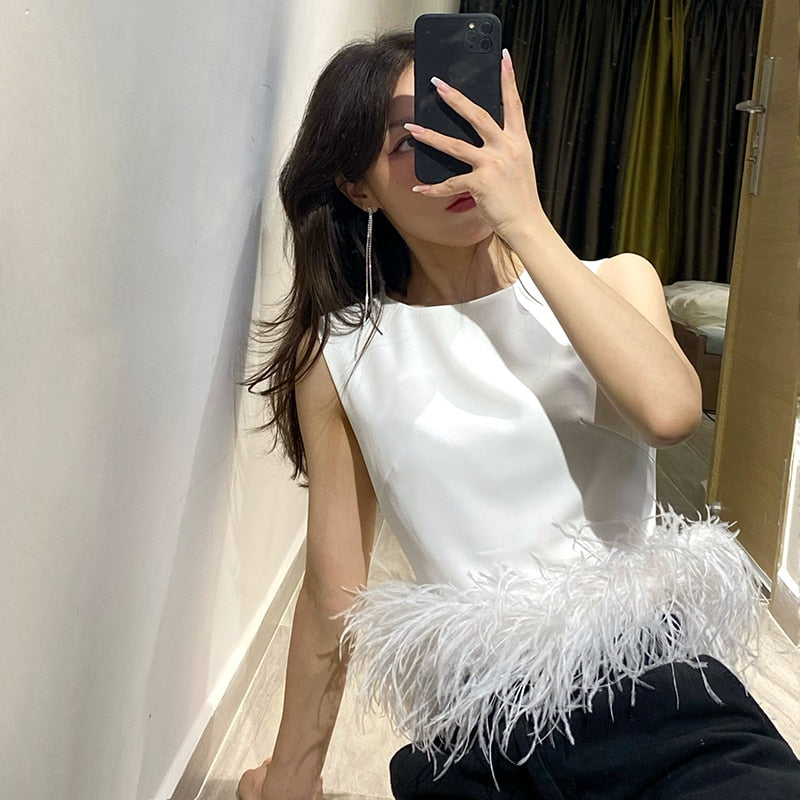 Top with feathers