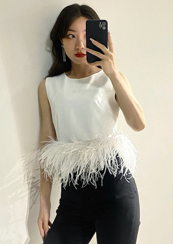 Top with feathers