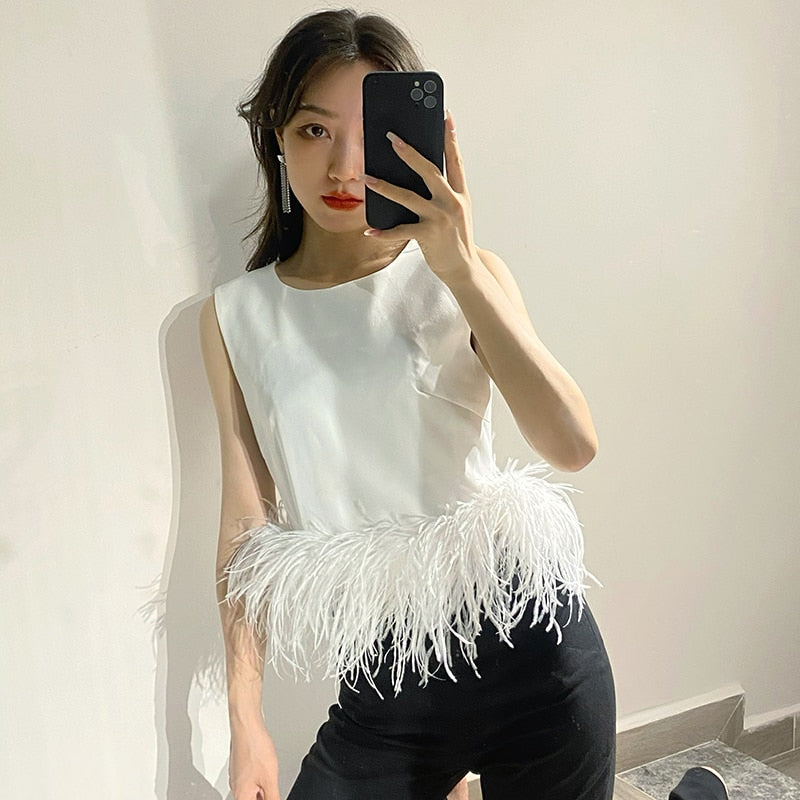 Top with feathers